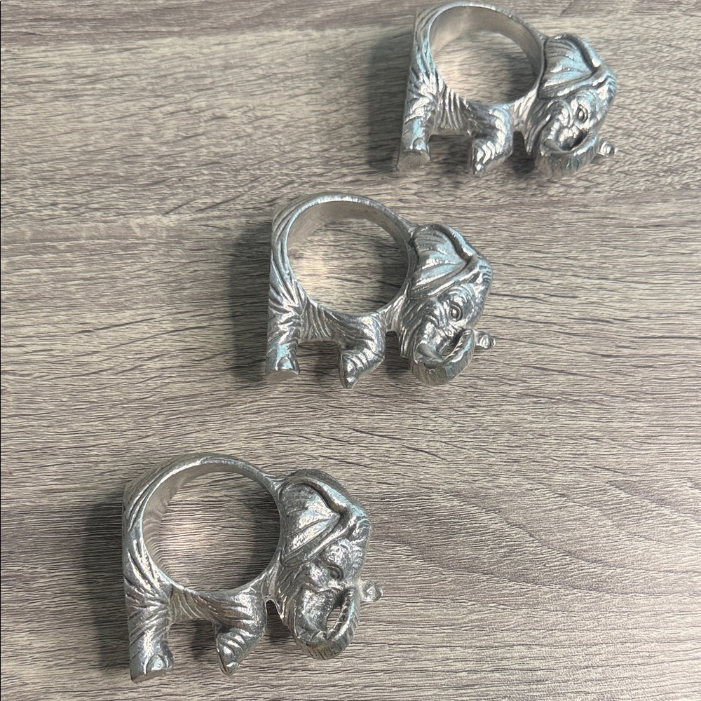 Set of three elephant silver napkin rings